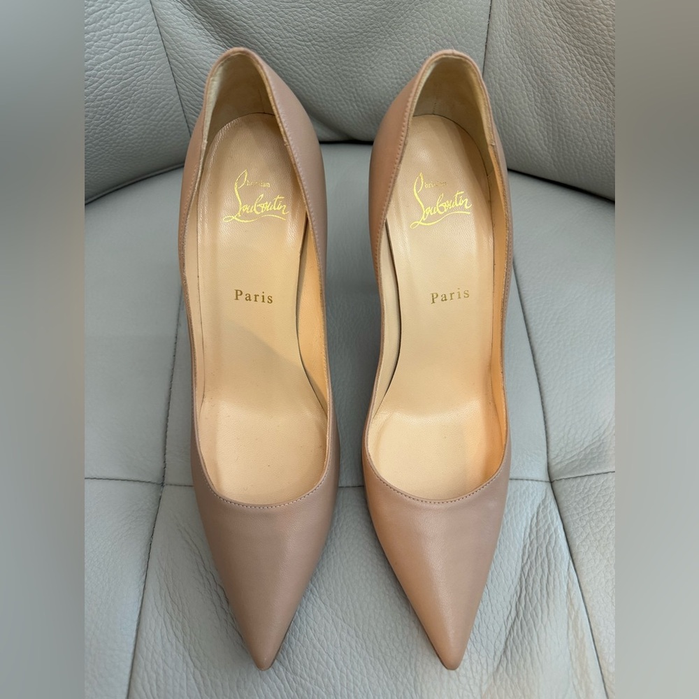 Christian Louboutin  Apostrophy Leather Pointed Red-Sole Pumps.